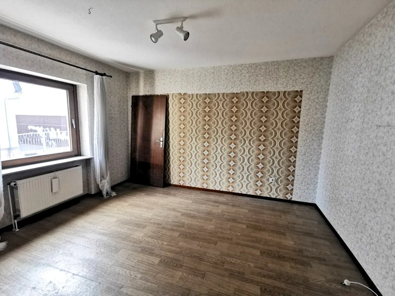 Erdgeschoss_Wohnzimmer, *Einfamilienhaus mit Garten und Garage zum Selbstgestalten*